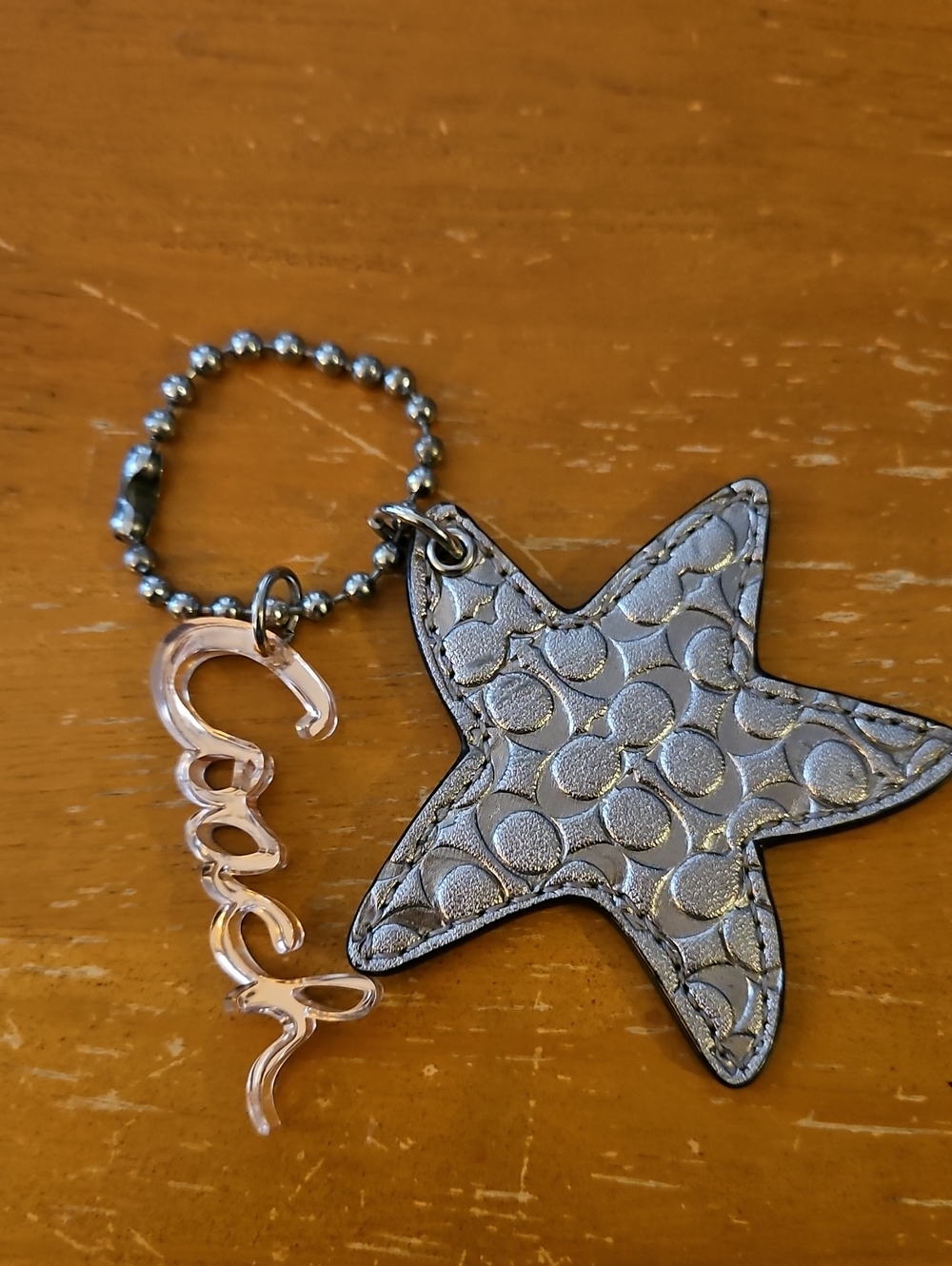 Coach Silver Star Keychain with Clear Script Charm